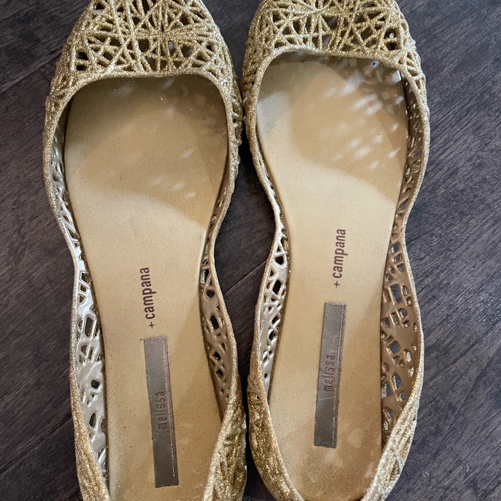 Womens mini Melissa size 10